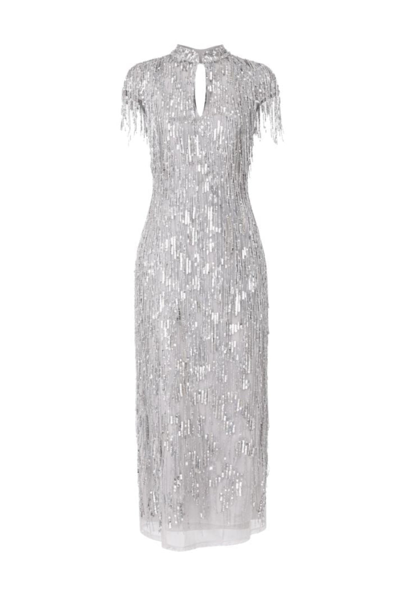 Raishma Amelia gown featuring elegant fabric and detailed design, showcased on a model in a glamorous setting.