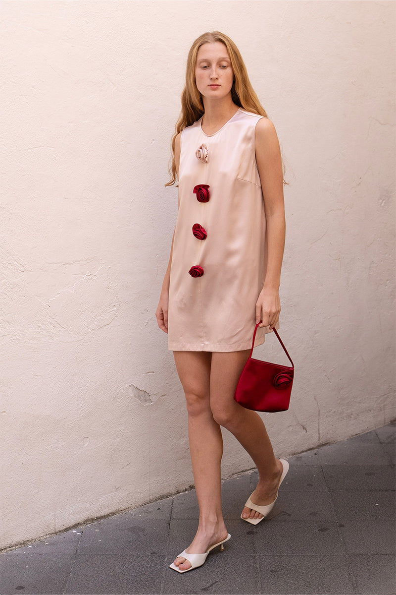 Pink Bloom Silk Sleeveless Dress by Not Just Pajama, a stylish mini dress with a smooth silk fabric and sleeveless design.