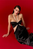 Nur Karaata Alice Pearl Maxi Dress featuring elegant pearl accents and flowing fabric, perfect for formal occasions.