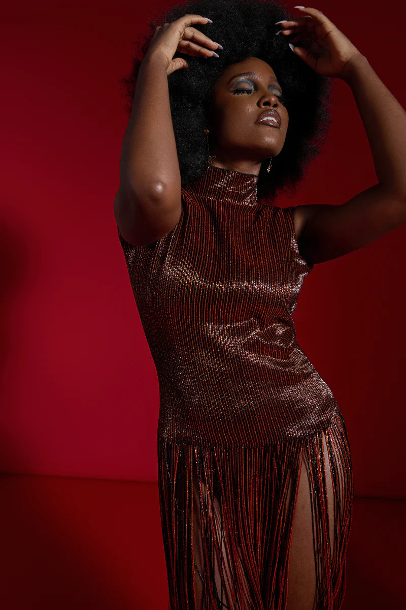 Onalaja Ellis brown fringe midi dress with flowing fabric and detailed fringe accents, perfect for stylish occasions.