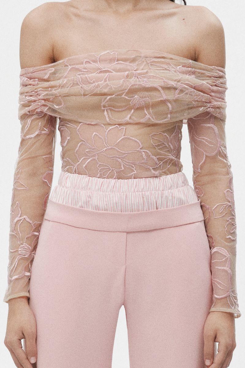 Pink double waistband pants by JC Pajares, showing a stylish pair of pants with a double waistband design and relaxed fit.