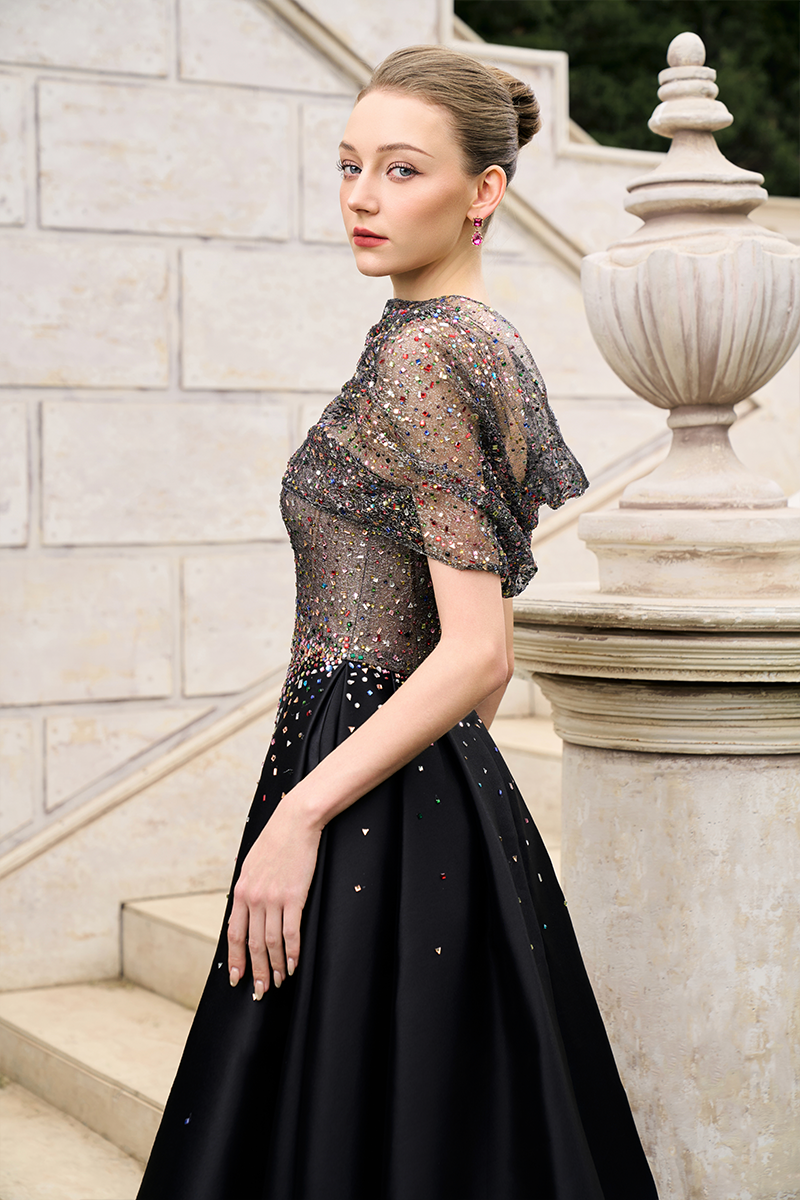Elegant Tracy Studio crystal lace and bamboo taffeta gown with intricate lace details and flowing fabric.