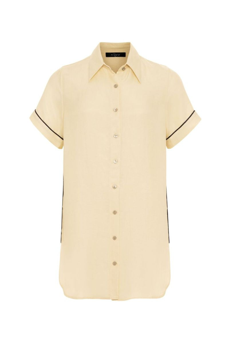 niLuu AQUAFLORA Logan button-down shirt in creme, 3/4 sleeve top with classic collar and subtle floral pattern.