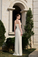 Tracy Studio matte weave gown shown from a 3/4 view, featuring elegant fabric and tailored design for formal occasions.
