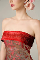 Red metallic jacquard and silk taffeta gown by I.H.F featuring elegant draping and intricate fabric details.