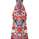 Le Thanh Hoa Mosaic gown featuring a vibrant mosaic pattern, elegant long sleeves, and flowing fabric for formal occasions.