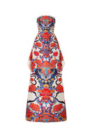 Le Thanh Hoa Mosaic gown featuring a vibrant mosaic pattern, elegant long sleeves, and flowing fabric for formal occasions.