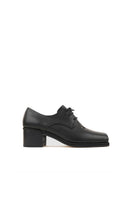 Je La Connais DROP DERBY black ballerina toe detail heels showing sleek design and stitching on the black leather upper.