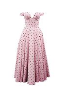 Do Long Urban Bloom midi dress featuring a floral print, sleeveless design, and knee-length cut on a model.
