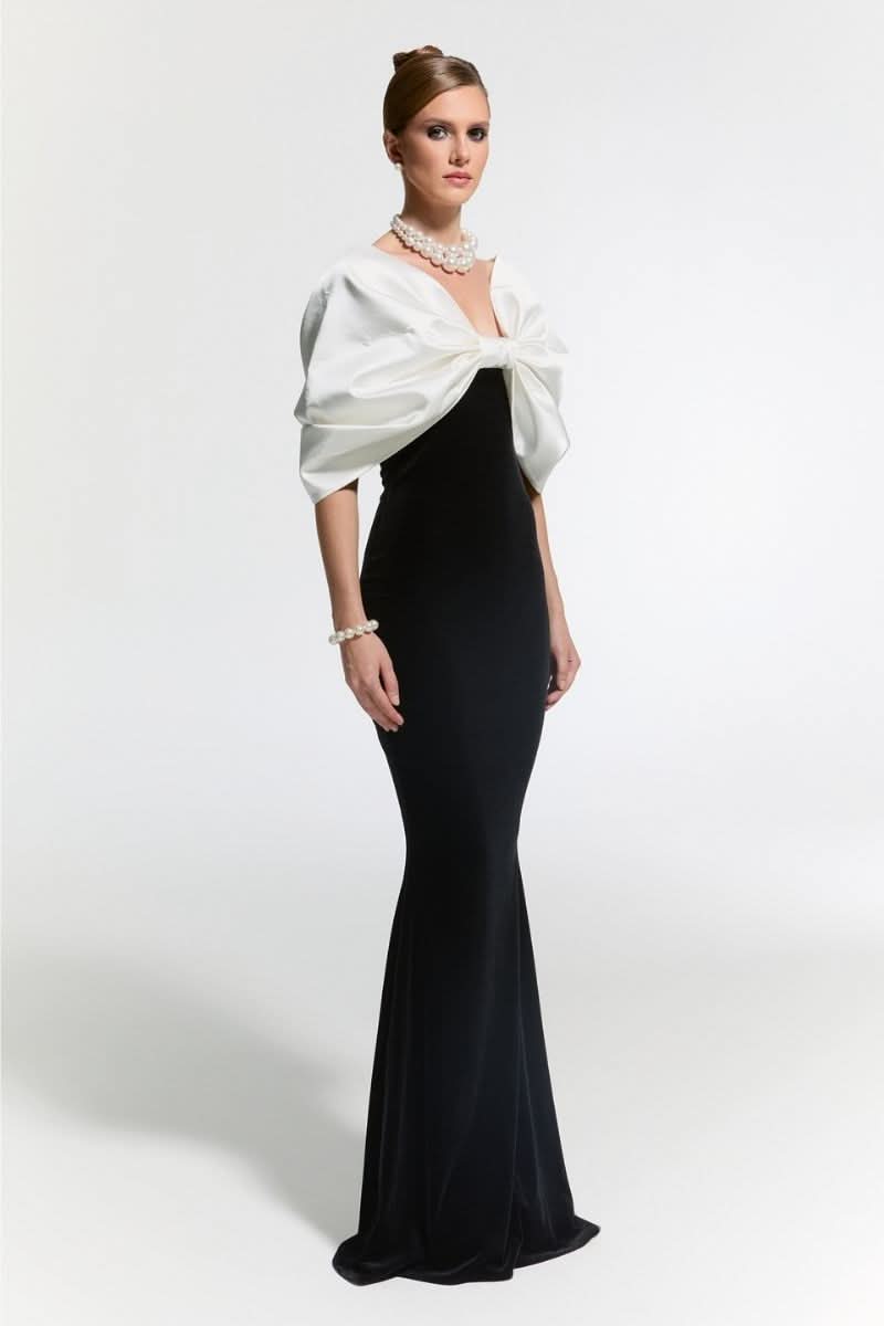 Nur Karaata CULT MIA X NUR KARAATA Buckingham gown, elegant long gown with intricate design and luxurious fabric, displayed on a mannequin.