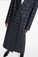 Acaria Studio Charlotte Coat in neutral fabric, featuring a tailored fit and stylish collar, displayed on a hanger.