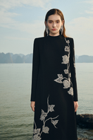 Lune De Soie velvet satin gown with long back flap, featuring elegant draped fabric and sophisticated design.