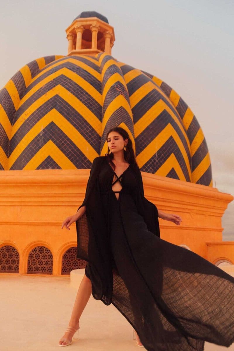 Kasia Kulenty Helia kaftan in midnight, a flowy maxi dress with long sleeves and elegant drape, perfect for stylish occasions.