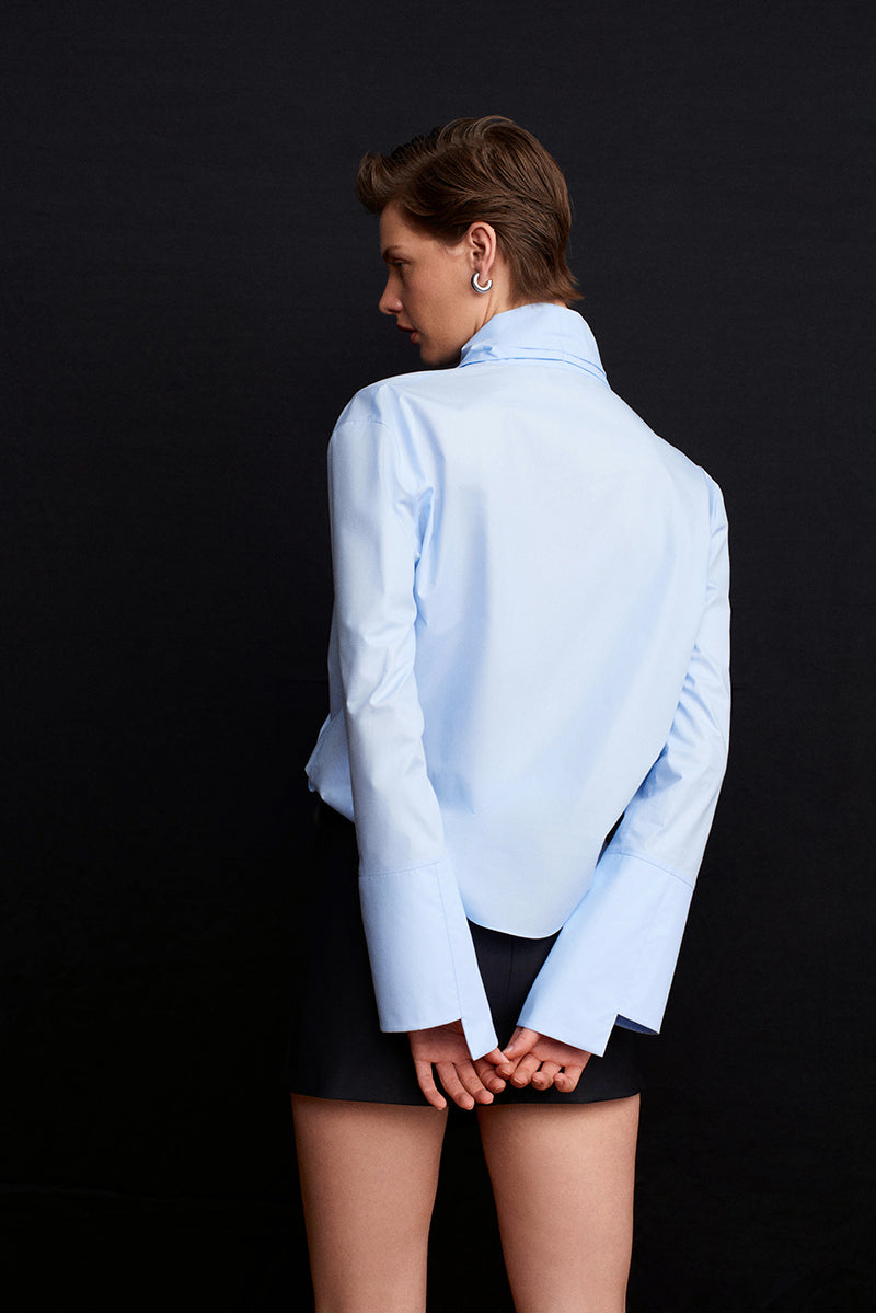 Blue historical shirt by Acaria Studio, featuring vintage-inspired design and classic fabric details.