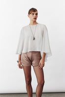 White chiffon cape jacket by Nazlı Ceren, elegant VIONA cape with flowing fabric and delicate design, suitable for formal wear.