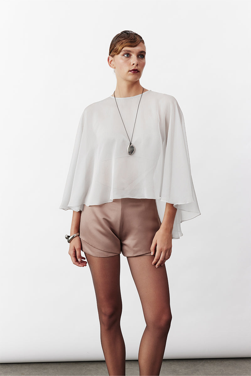 White chiffon cape jacket by Nazlı Ceren, elegant VIONA cape with flowing fabric and delicate design, suitable for formal wear.