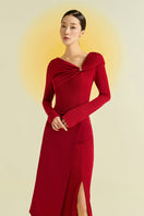 Red Twinkle Knit Maxi Dress by EEGEN STUDIO, featuring a flowing knit fabric and elegant maxi length, shown on a model.
