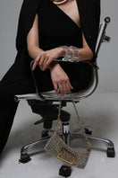 Silver Sakura shoulder bag by Silvia Gnecchi featuring a sleek design and elegant silver finish.