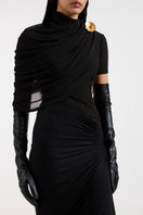 Deme By Gabriella Rhea Black gown featuring elegant fabric and a flowing silhouette, perfect for formal occasions.