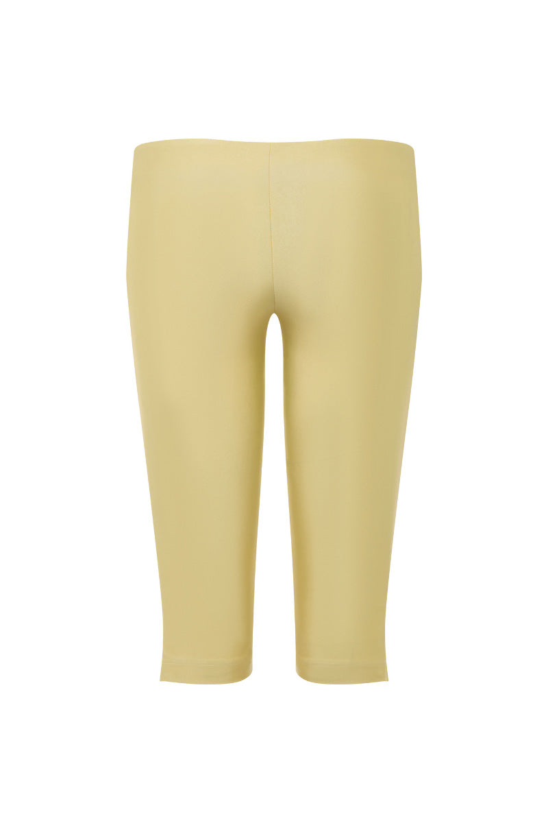Suncillo dusty butter yellow capris pants displayed on a model, showcasing casual, comfortable ankle-length pants with a relaxed fit.