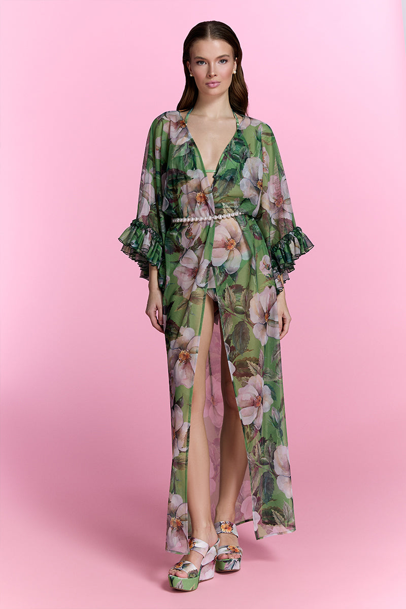 Nur Karaata Havana Glow beach dress cover-up with a flowy, lightweight fabric and vibrant tropical print, perfect for beachwear.