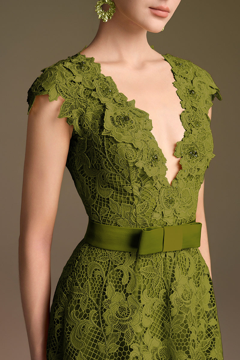 Green lace V-neck A-line gown by I.H.F with intricate lace details and a flowy silhouette, perfect for formal occasions.