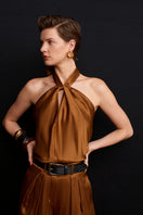 Acaria Studio Jill satin top in copper, featuring a sleek, shiny fabric with a fitted design and elegant neckline.