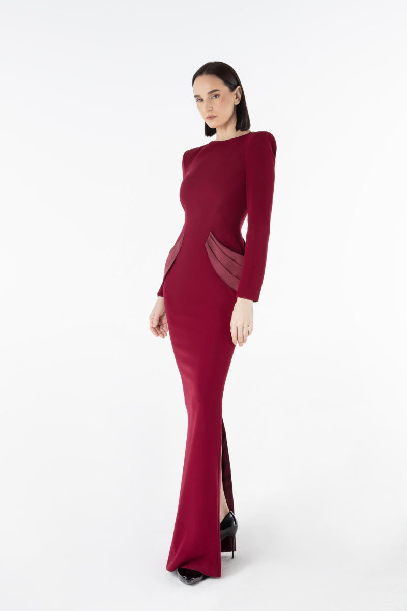 Lili Blanc crepe gown with elegant flowy fabric and detailed neckline, perfect for formal occasions.