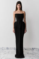 Black MUNA gown with hook details by Balykina, featuring elegant fabric and a flowing silhouette.