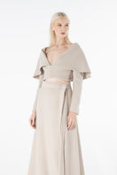 Lili Blanc cashmere wrap skirt, a long maxi skirt with soft, cozy cashmere fabric and elegant wrap design.