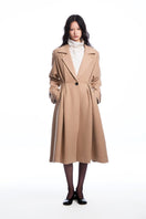 Beige wool coat with pleats from Chictopia, featuring a tailored fit and classic style perfect for cold weather.