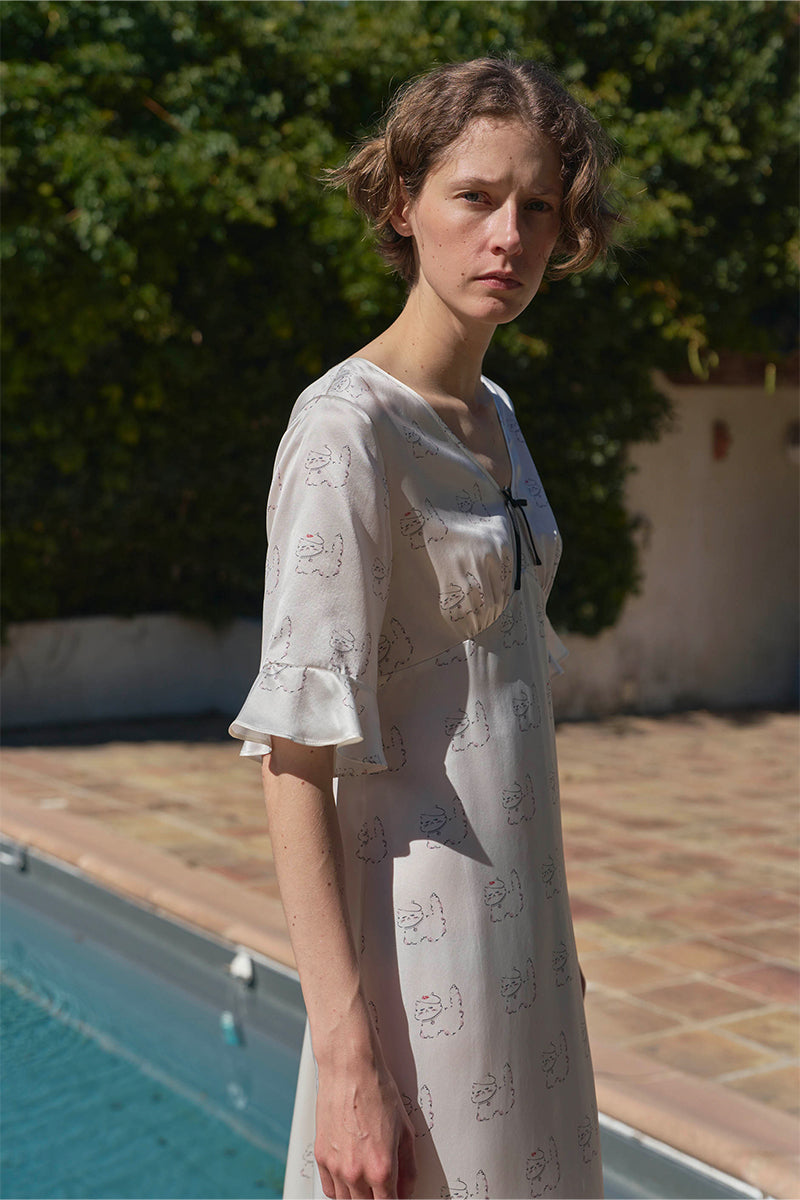KIKI Pearl Cat 22 Momme Silk Nightdress by Not Just Pajama, elegant silk nightgown with delicate pearl accents on a model.