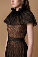 Black VINE GUIPURE LACE gown by I.H.F featuring intricate lace details and a flowing silhouette.