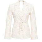 Cream JORA fringe open-back blazer by SÉLONE featuring a stylish fringe detail and tailored fit, perfect for chic, modern looks.