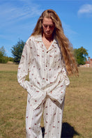 Unisex brown print twill pajamas set with long sleeves and matching pants, comfortable and stylish sleepwear by Not Just Pajama.