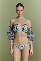 Nur Karaata Misty Mirage Bikini featuring a colorful, patterned bikini top and matching bottoms on a model.