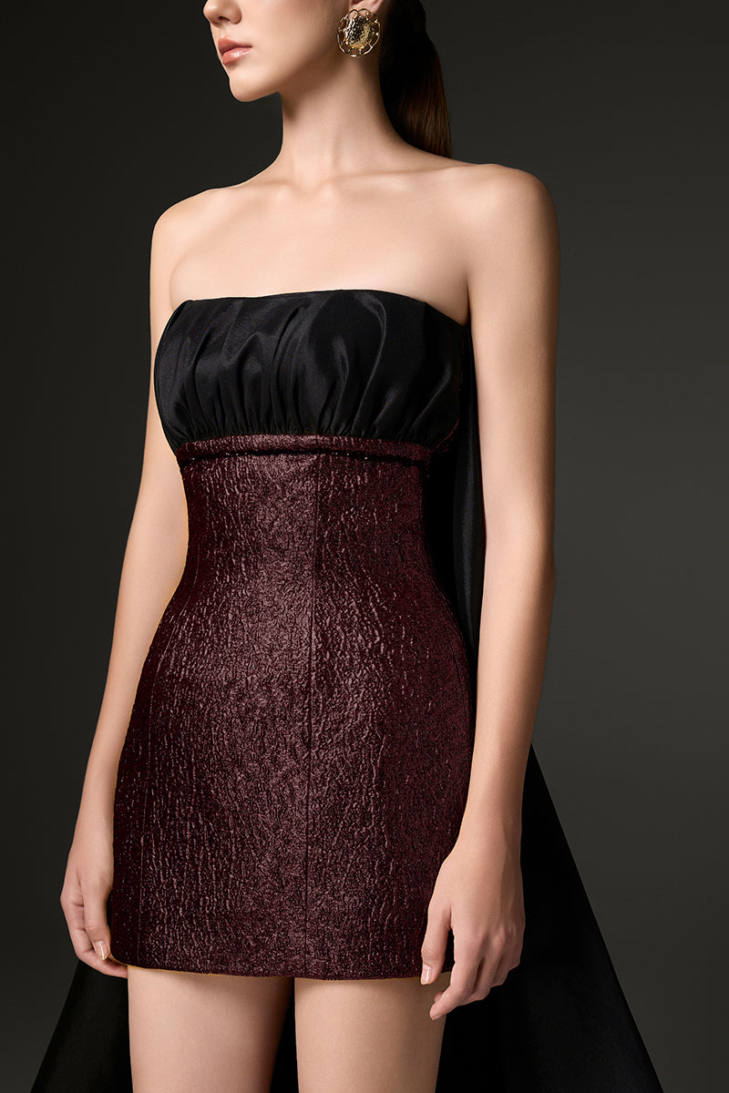 Fuchsia jacquard bustier mini dress with train from I.H.F Studio, featuring intricate fabric details and elegant silhouette.