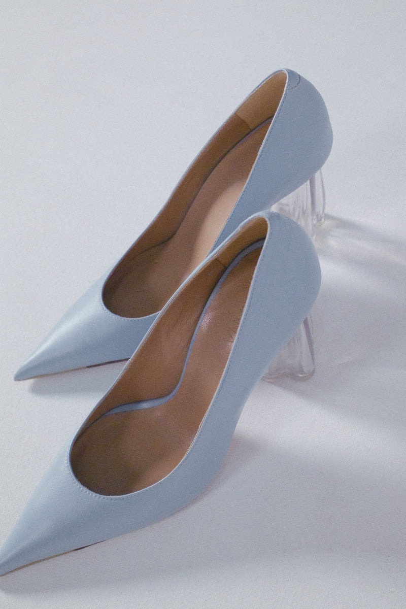 Blue Fiorellini glass pump heels by House of Atana with transparent glass detailing and sleek high heel design.