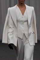 Lili Blanc chic sculpted sleeveless vest in a fitted design, shown in a neutral color on a plain background.