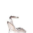 Terry de Havilland MARGAUX gold heels with sleek design and pointed toes, displayed on a neutral background.
