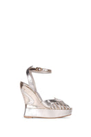 Terry de Havilland MARGAUX gold heels with sleek design and pointed toes, displayed on a neutral background.
