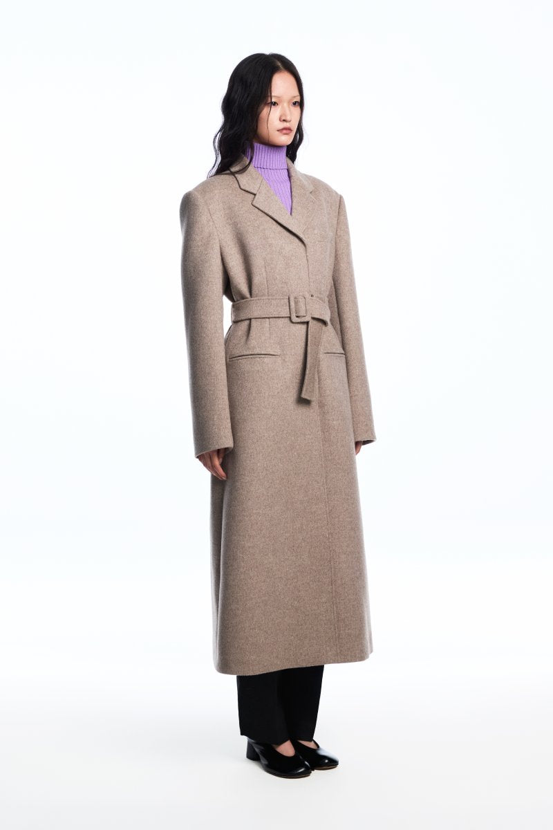 Chictopia belted long line coat with a tailored fit, featuring a classic collar, side pockets, and a stylish belt detail.