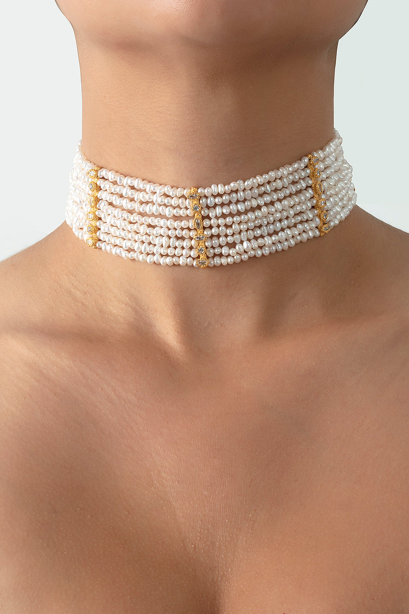 PERACAS Patmos Waves Pearl Choker necklace featuring elegant wave design with white pearls on a delicate chain.
