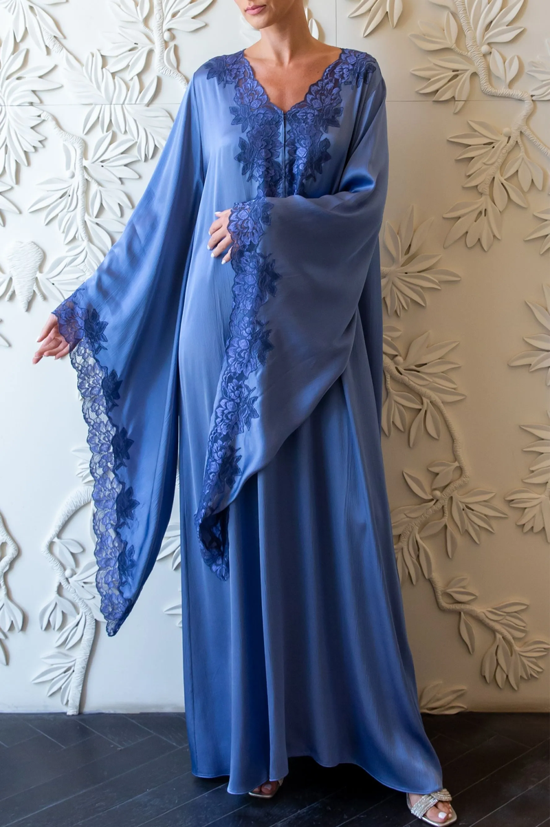 Bocan Couture Adelaide long buttoned maxi dress with a flowing silhouette and elegant design, shown hanging against a neutral background.