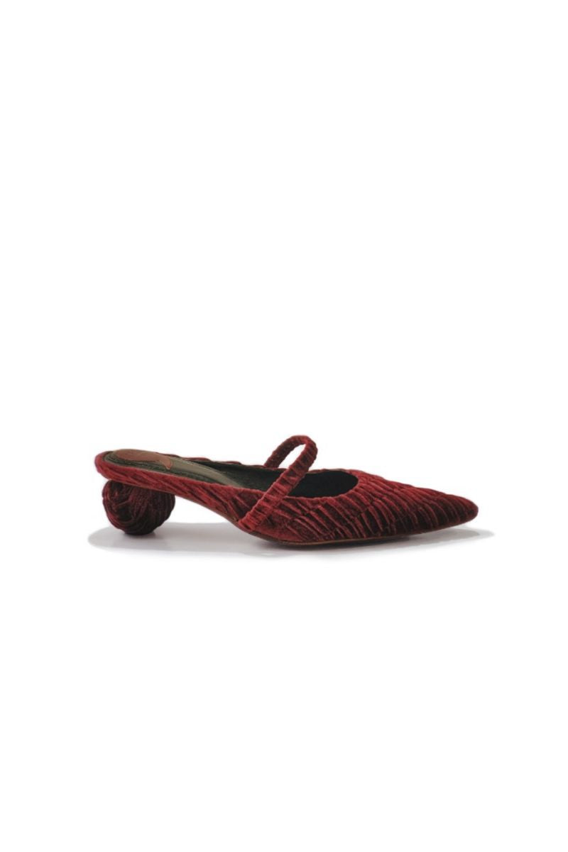 Christin Wu Salma maroon velour mules heels showing the stylish pointed toe and plush velvet material.