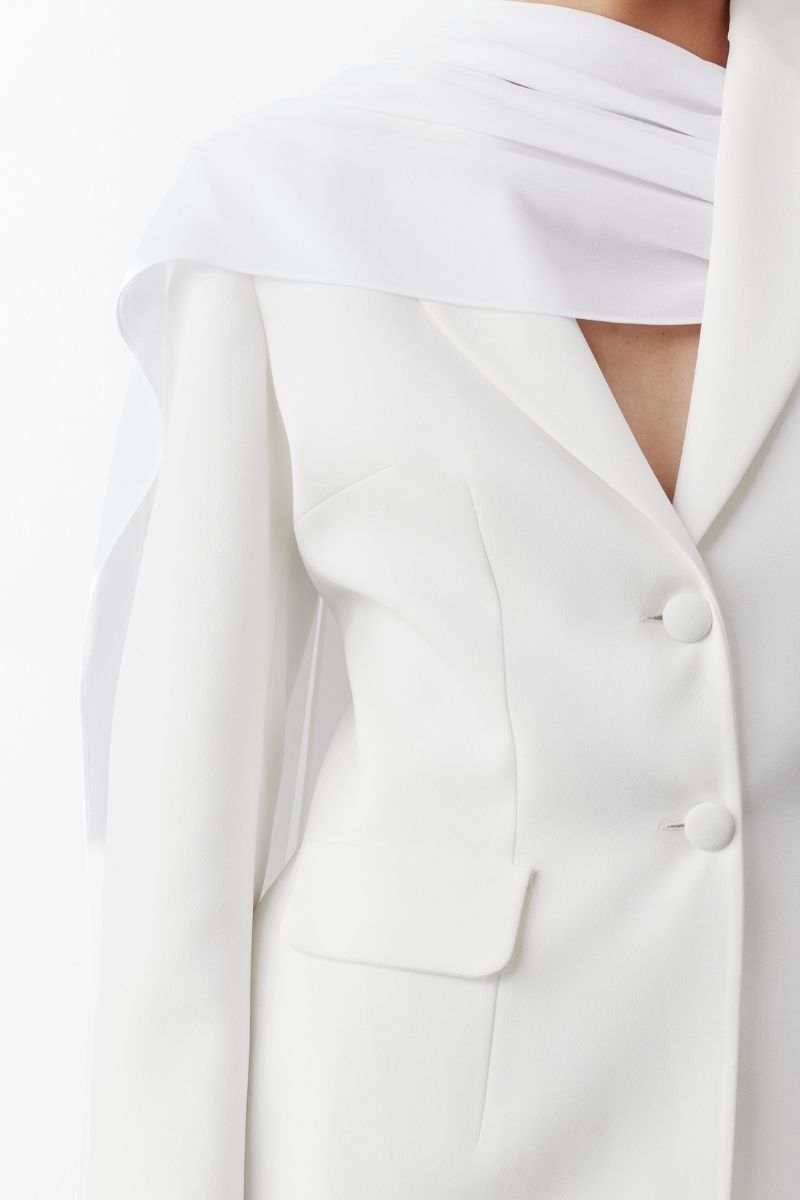 White Marylebone blazer with chiffon details by Nazlı Ceren, featuring tailored fit and elegant design for sophisticated style.