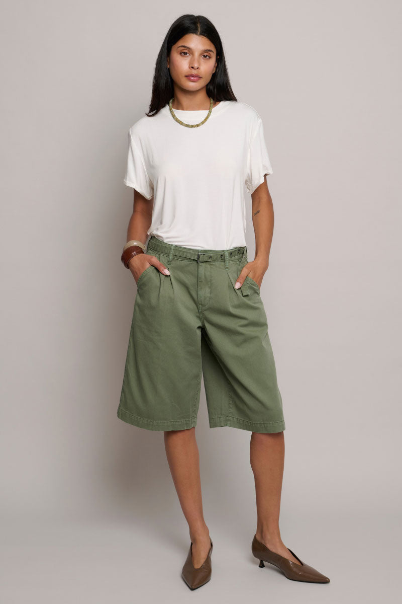 TT Studios PAM Short in Greene St. green shorts with a relaxed fit and casual style, shown on a model.