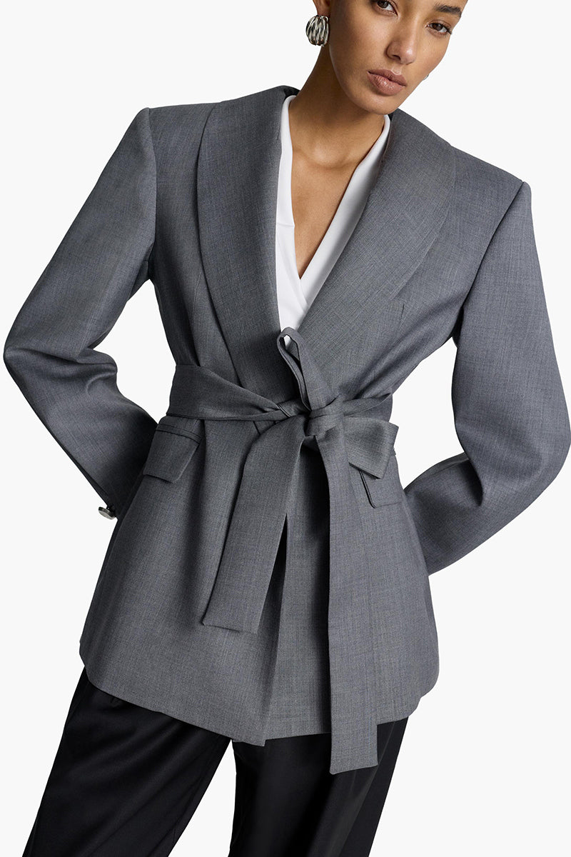 Acaria Studio Wisdom Blazer in tailored black fabric, featuring a classic lapel collar and button closure.