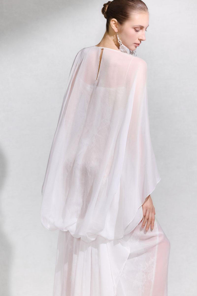 Arti Apparel GENUS maxi dress featuring flowing fabric and a stylish design, perfect for casual or formal occasions.