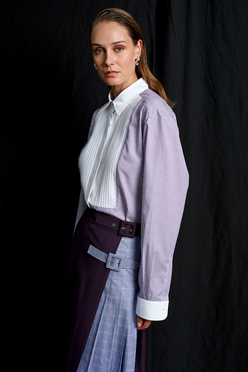 Purple striped Acaria Studio Heritage non-iron shirt displayed on a hanger, showing the collar and button details.